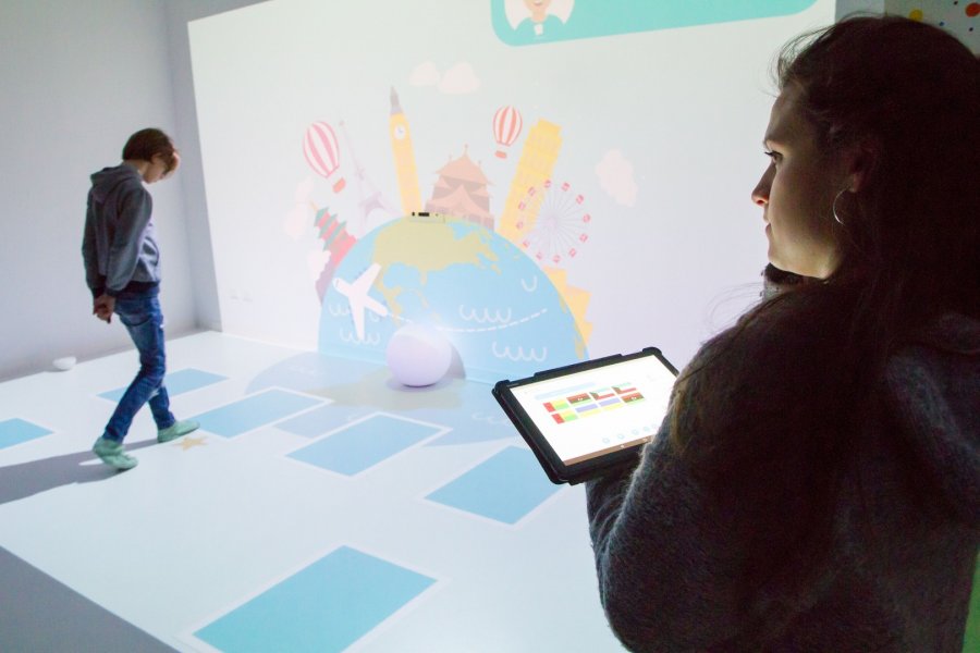 The Magic Room is an innovative technological solution that transforms any physical room into a "smart" multisensory space in which the user can interact with lights, immersive projections on walls and floors, music, sounds, aromas, and props through gestures, body movements, manipulation and voice.