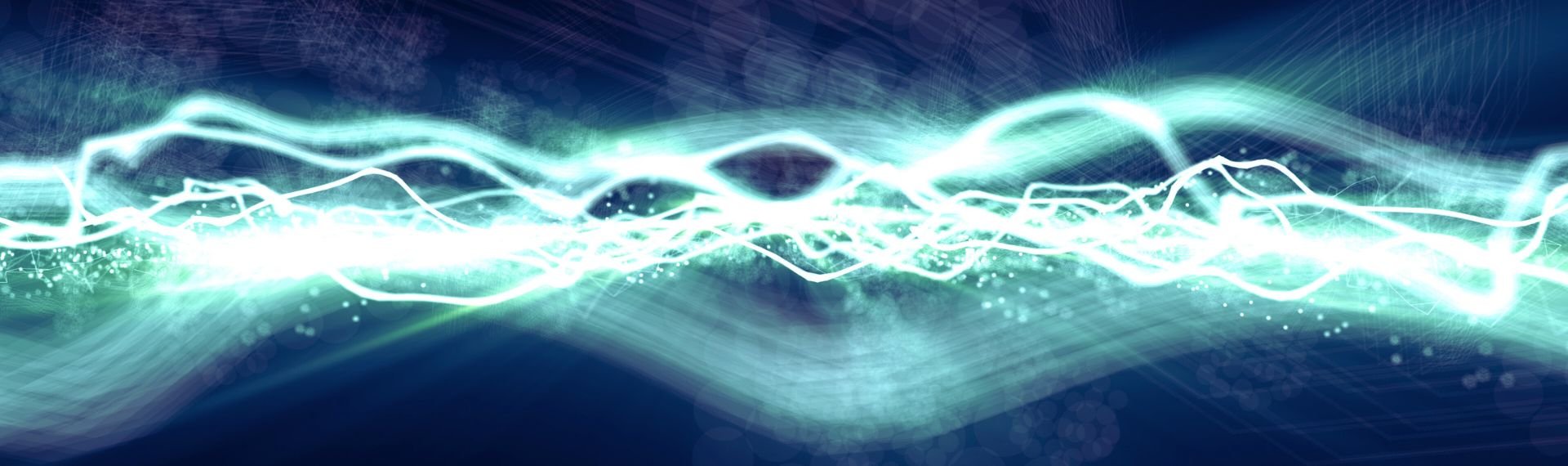 Un'immagine digitale che rappresenta un'onda di luce colorata e fluida. Un'immagine digitale che rappresenta un'onda di luce colorata e fluida.